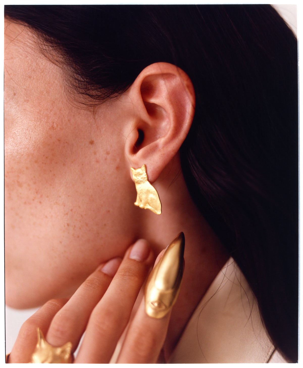 A model wearing Boncuk Earrings from EFEK Cats of Istanbul collection, photographed by Alessandro Oliva.