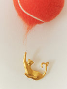 BİBER cat pendant in a still life from EFEK’s Cats of Istanbul collection