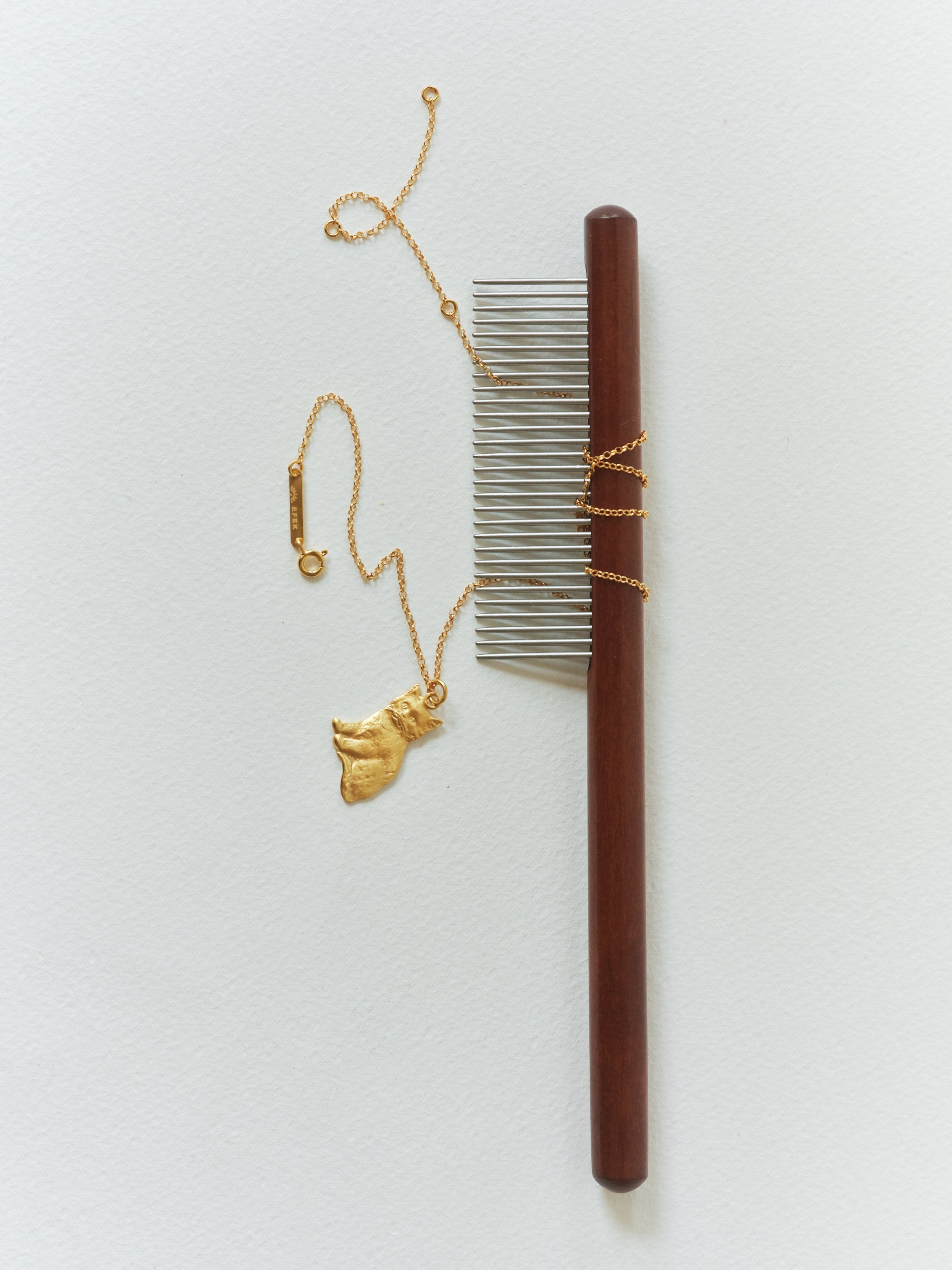BONCUK cat pendant in a still life from EFEK’s Cats of Istanbul collection